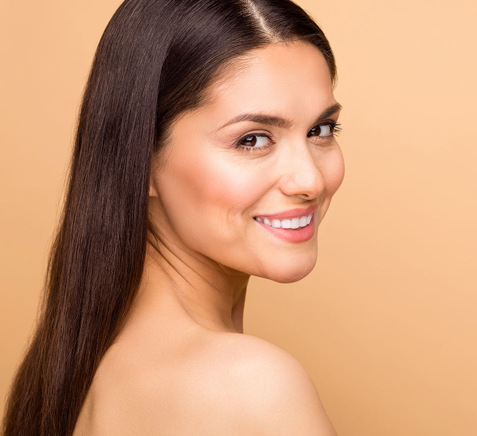 Brunette with beautiful skin smiling