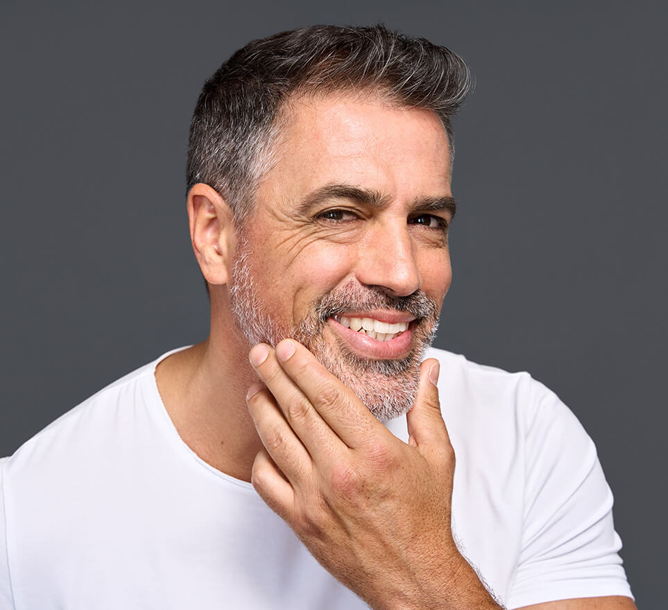 Handsome mature man in white shirt