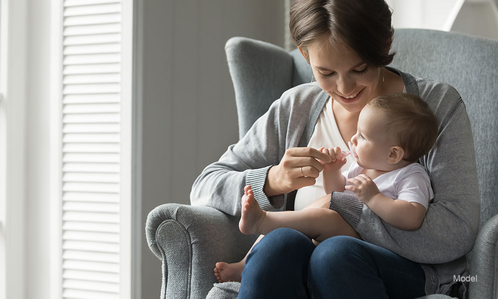 woman with her baby